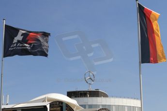 World © Octane Photographic Ltd. Saturday 19th July 2014. F1 and German flags with Mercedes badge. Digital Ref: