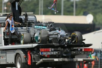 World © Octane Photographic Ltd. Saturday 19th July 2014. German GP, Hockenheim. - Formula 1 Qualifying. Mercedes AMG Petronas F1 W05 Hybrid – Lewis Hamilton's wrecked car being recovered after rear brake failure. Digital Ref: