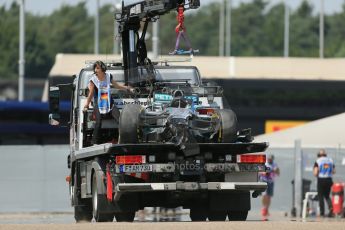 World © Octane Photographic Ltd. Saturday 19th July 2014. German GP, Hockenheim. - Formula 1 Qualifying. Mercedes AMG Petronas F1 W05 Hybrid - Lewis Hamilton's wrecked car being recovered after rear brake failure. Digital Ref: