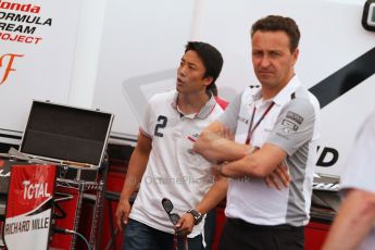 World © Octane Photographic Ltd. Thursday 17th July 2014. GP2 Paddock – German GP - Hockenheim. Takuya Izawa - ART Grand Prix and Emmanuel Esnault, McLaren Support operations Manager. Digital Ref : 1034CB7D4563