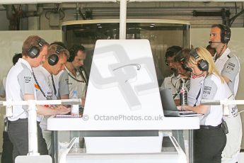 World © Octane Photographic Ltd. Friday 25th July 2014. Hungarian GP, Hungaroring - Budapest. - Formula 1 Practice 1. McLaren Mercedes MP4/29 - Jenson Button and Kevin Magnussen in engineering debrief. Digital Ref: 1061CB7D6655