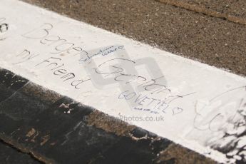 World © Octane Photographic Ltd. Sunday 27th July 2014. Hungarian GP, Hungaroring - Budapest. Fan writing on start line. Digital Ref: 1072CB7D8245