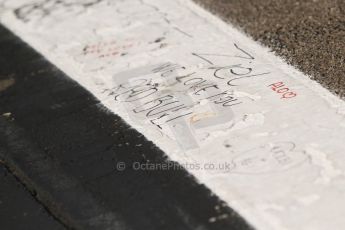 World © Octane Photographic Ltd. Sunday 27th July 2014. Hungarian GP, Hungaroring - Budapest. Fan writing on start line. Digital Ref: 1072CB7D8247