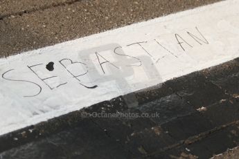 World © Octane Photographic Ltd. Sunday 27th July 2014. Hungarian GP, Hungaroring - Budapest.  Fan writing on start line. Digital Ref: 1072CB7D8249