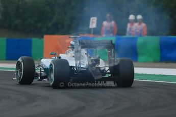 World © Octane Photographic Ltd. Saturday 26th July 2014. Hungarian GP, Hungaroring - Budapest. Qualifying. Mercedes AMG Petronas F1 W05 Hybrid – Lewis Hamilton exhaust goes on fire.  Digital Ref: 1065LB1D2053