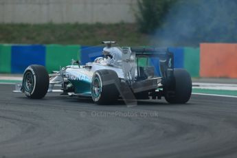 World © Octane Photographic Ltd. Saturday 26th July 2014. Hungarian GP, Hungaroring - Budapest. Qualifying. Mercedes AMG Petronas F1 W05 Hybrid – Lewis Hamilton exhaust goes on fire. Digital Ref: 1065LB1D2056