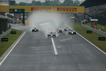World © Octane Photographic Ltd. Sunday 27th July 2014. Hungarian GP, Hungaroring - Budapest. Race. Mercedes AMG Petronas F1 W05 Hybrid - Nico Rosberg leading during race start. Digital Ref: 1073LB1D3338