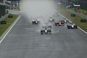 World © Octane Photographic Ltd. Sunday 27th July 2014. Hungarian GP, Hungaroring - Budapest. Race. Mercedes AMG Petronas F1 W05 Hybrid - Nico Rosberg leading during race start. Digital Ref: 1073LB1D3351