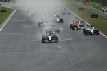 World © Octane Photographic Ltd. Sunday 27th July 2014. Hungarian GP, Hungaroring - Budapest. Race. Mercedes AMG Petronas F1 W05 Hybrid - Nico Rosberg leading during race start. Digital Ref: 1073LB1D3354