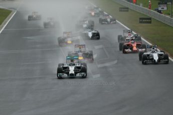 World © Octane Photographic Ltd. Sunday 27th July 2014. Hungarian GP, Hungaroring - Budapest. Race. Mercedes AMG Petronas F1 W05 Hybrid - Nico Rosberg leading during race start. Digital Ref: 1073LB1D3357