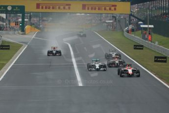 World © Octane Photographic Ltd. Sunday 27th July 2014. Hungarian GP, Hungaroring - Budapest. Race. Marussia F1 Team MR03 - Max Chilton about to get passed by Lewis Hamilton. Digital Ref: 1073LB1D3599