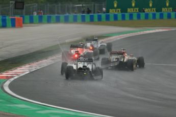 orld © Octane Photographic Ltd. Sunday 27th July 2014. Hungarian GP, Hungaroring - Budapest. Race. Lotus F1 Team E22 – Pastor Maldonado passing the back of the grid. Digital Ref: 1073LB1D3608