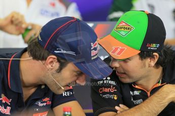 World © Octane Photographic Ltd. Thursday 24th July 2014. Hungarian GP, Hungaroring - Budapest - Formula 1 FIA Press Conference. Sahara Force India VJM07 – Sergio Perez talks with Scuderia Toro Rosso driver Jean-Eric Vergne. Digital Ref: 1054LB1D9135