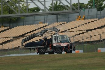 World © Octane Photographic Ltd. Tuesday 13th May 2014. Circuit de Catalunya - Spain - Formula 1 In-Season testing. Scuderia Toro Rosso STR9 - Jean-Eric Vergne's car is recovered after stopping on track 10 minutes into the session. Digital Ref: