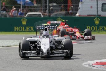 World © Octane Photographic Ltd. Sunday 7th September 2014, Italian GP, Monza - Italy. - Formula 1 Race. Williams Martini Racing FW36 – Valtteri Bottas and Scuderia Ferrari F14T – Kimi Raikkonen. Digital Ref: 1112LB1D6166