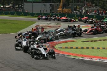 World © Octane Photographic Ltd. Sunday 7th September 2014, Italian GP, Monza - Italy. - Formula 1 Race. The McLaren Mercedes MP4/29 of Kevin Magnussen fending off the Williams Martini Racing FW36 of Felipe Massa. Digital Ref: 1112LB1D7822