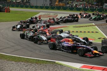 World © Octane Photographic Ltd. Sunday 7th September 2014, Italian GP, Monza - Italy. - Formula 1 Race. Vettel in his Red Bull and Jenson Button's McLaren go wheel to wheel on the 1st lap. Digital Ref: 1112LB1D7831