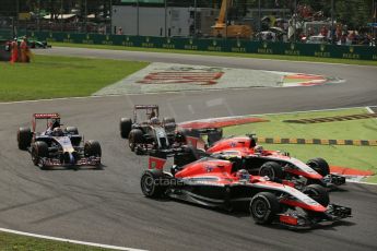 World © Octane Photographic Ltd. Sunday 7th September 2014, Italian GP, Monza - Italy. - Formula 1 Race. Marussia F1 Team MR03 – Max Chilton and Jules Bianchi head Lotus F1 Team E22 - Romain Grosjean and Scuderia Toro Rosso STR 9 – Daniil Kvyat. Digital Ref: 1112LB1D7855