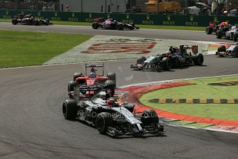 World © Octane Photographic Ltd. Sunday 7th September 2014, Italian GP, Monza - Italy. - Formula 1 Race. McLaren Mercedes MP4/29 - Jenson Button and Scuderia Ferrari F14T - Fernando Alonso. Digital Ref: 1112LB1D7889