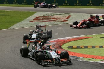 World © Octane Photographic Ltd. Sunday 7th September 2014, Italian GP, Monza - Italy. - Formula 1 Race. Sahara Force India VJM07 – Sergio Perez and Nico Hulkenburg ahead of Scuderia Ferrari F14T – Kimi Raikkonen. Digital Ref: 1112LB1D7959