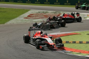 World © Octane Photographic Ltd. Sunday 7th September 2014, Italian GP, Monza - Italy. - Formula 1 Race. Marussia F1 Team MR03 – Jules Bianchi and Lotus F1 Team E22 - Romain Grosjean. Digital Ref: 1112LB1D7988