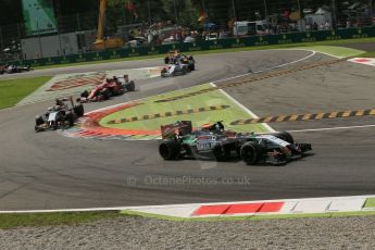 World © Octane Photographic Ltd. Sunday 7th September 2014, Italian GP, Monza - Italy. - Formula 1 Race. Sahara Force India VJM07 – Sergio Perez and Nico Hulkenburg ahead of Scuderia Ferrari F14T – Kimi Raikkonen. Digital Ref: 1112LB1D8027