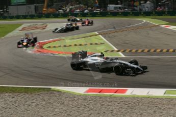 World © Octane Photographic Ltd. Sunday 7th September 2014, Italian GP, Monza - Italy. - Formula 1 Race. McLaren Mercedes MP4/29 – Kevin Magnussen and Infiniti Red Bull Racing RB10 - Sebastian Vettel. Digital Ref: 1112LB1D8166