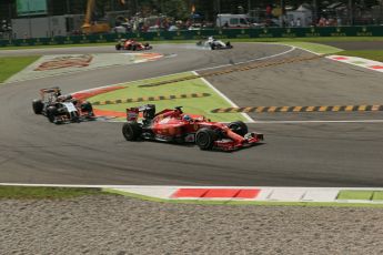 World © Octane Photographic Ltd. Sunday 7th September 2014, Italian GP, Monza - Italy. - Formula 1 Race. Scuderia Ferrari F14T - Fernando Alonso ahead of Sahara Force India VJM07 – Sergio Perez. Digital Ref: 1112LB1D8174