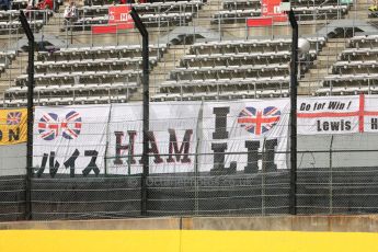 World © Octane Photographic Ltd. Friday 3rd October 2014, Japanese Grand Prix - Suzuka. - Formula 1 Practice 2. Lewis Hamilton fans flag. Digital Ref :