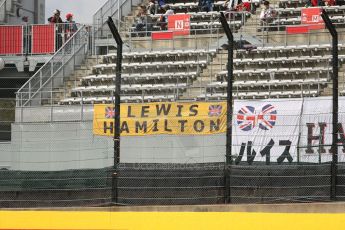 World © Octane Photographic Ltd. Friday 3rd October 2014, Japanese Grand Prix - Suzuka. - Formula 1 Practice 2. Lewis Hamilton fans flag. Digital Ref :