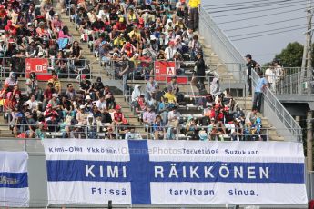 World © Octane Photographic Ltd. Friday 3rd October 2014, Japanese Grand Prix - Suzuka. - Formula 1 Practice 2. Kimi Raikkonen fans flag. Digital Ref: