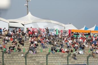 World © Octane Photographic Ltd. Friday 3rd October 2014, Japanese Grand Prix - Suzuka. - Formula 1 Practice 2. Jarno Trulli fans flags. Digital Ref: