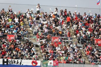 World © Octane Photographic Ltd. Friday 3rd October 2014, Japanese Grand Prix - Suzuka. - Formula 1 Practice 2. Heikki Kovalainen fans flags. Digital Ref: