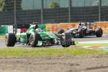 World © Octane Photographic Ltd. Friday 3rd October 2014, Japanese Grand Prix - Suzuka. - Formula 1 Practice 2. Caterham F1 Team CT05 – Marcus Ericsson and McLaren Mercedes MP4/29 - Jenson Button. Digital Ref: