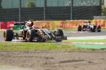 World © Octane Photographic Ltd. Friday 3rd October 2014, Japanese Grand Prix - Suzuka. - Formula 1 Practice 2. Lotus F1 Team E22 – Pastor Maldonado and Scuderia Toro Rosso STR 9 – Daniil Kvyat. Digital Ref:
