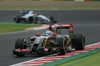 World © Octane Photographic Ltd. Friday 3rd October 2014, Japanese Grand Prix - Suzuka. - Formula 1 Practice 2. Lotus F1 Team E22 - Romain Grosjean and McLaren Mercedes MP4/29 - Jenson Button. Digital Ref: