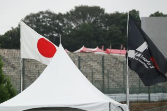 World © Octane Photographic Ltd. Thursday 2nd October 2014, Japanese Grand Prix - Suzuka. - Formula 1 Paddock. Japanese and F1 flags. Digital Ref: 1129CB1D2373