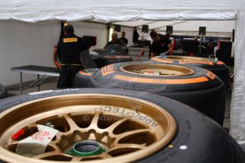 World © Octane Photographic Ltd. 2014 Formula 1 Winter Testing, Circuito de Velocidad, Jerez Winter testing set up day – Monday 27th January 2014. Pirelli crew hard at work fitting Toro Rosso tyres (orange and the winter test spec compounds seen here). Digital Ref : 0879cb7d7001