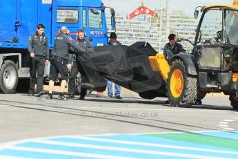 World © Octane Photographic Ltd. 2014 Formula 1 Winter Testing, Circuito de Velocidad, Jerez. Tuesday 28th January 2014. Day 1. Mercedes AMG Petronas F1 W05 – Lewis Hamilton. Lewis Hamilton crashes at 1st corner causing a red flag, the W05 car being lifted onto the support truck. Digital Ref: 0882lb1d0262