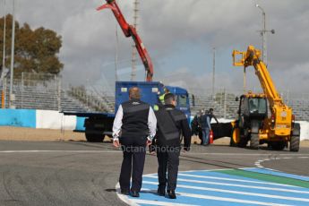 World © Octane Photographic Ltd. 2014 Formula 1 Winter Testing, Circuito de Velocidad, Jerez. Tuesday 28th January 2014. Day 1. Mercedes AMG Petronas F1 W05 – Lewis Hamilton. FIA members walk up the track to view the damage which Lewis Hamilton caused after crashing into barriers at turn one. Digital Ref: 0882lw7d7430