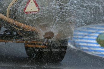 World © Octane Photographic Ltd. 2014 Formula 1 Winter Testing, Circuito de Velocidad, Jerez. Wednesday 29th January 2014. Day 2. FIA and Pirelli changes artificial wet day to Day 2 rather than Day 4, tractor takes water sprinkler around the track to recreate wet conditions. Digital Ref: 0886lb1d0523