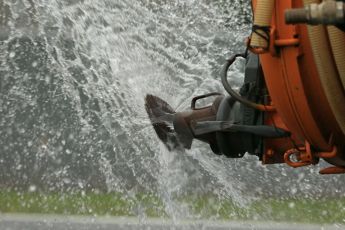 World © Octane Photographic Ltd. 2014 Formula 1 Winter Testing, Circuito de Velocidad, Jerez. Wednesday 29th January 2014. Day 2. FIA and Pirelli changes artificial wet day to Day 2 rather than Day 4, tractor takes water sprinkler around the track to recreate wet conditions. Digital Ref: 0886lb1d0531