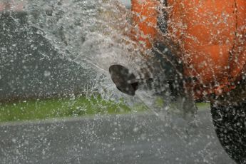 World © Octane Photographic Ltd. 2014 Formula 1 Winter Testing, Circuito de Velocidad, Jerez. Wednesday 29th January 2014. Day 2. FIA and Pirelli changes artificial wet day to Day 2 rather than Day 4, tractor takes water sprinkler around the track to recreate wet conditions. Digital Ref: 0886lb1d0534