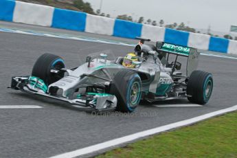 World © Octane Photographic Ltd. 2014 Formula 1 Winter Testing, Circuito de Velocidad, Jerez. Friday 31st January 2014. Day 4. Mercedes AMG Petronas F1 W05 - Nico Rosberg briefly trying out his older yellow helmet. Digital Ref: 0888cb1d1310