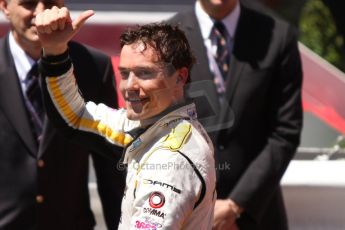 World © Octane Photographic Ltd. Friday 23rd May 2014. GP2 Feature Race – Monaco, Monte Carlo. Jolyon Palmer celebrates on his way to the podium - DAMS. Digital Ref : 0963CB7D3086