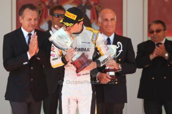 World © Octane Photographic Ltd. Friday 23rd May 2014. GP2 Feature Race – Monaco, Monte Carlo. Jolyon Palmer kisses his winners trophy - DAMS. Digital Ref : 0963CB7D3101