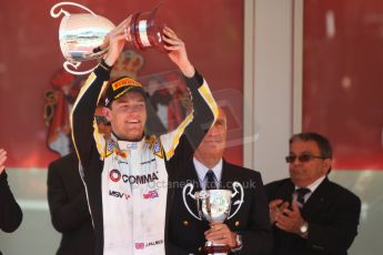 World © Octane Photographic Ltd. Friday 23rd May 2014. GP2 Feature Race – Monaco, Monte Carlo. Jolyon Palmer raises his winners trophy - DAMS. Digital Ref : 0963CB7D3106
