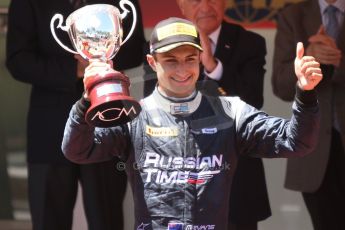 World © Octane Photographic Ltd. Friday 23rd May 2014. GP2 Feature Race – Monaco, Monte Carlo. Mitch Evans raises his 2nd place trophy - RT Russian Time. Digital Ref : 0963CB7D3127