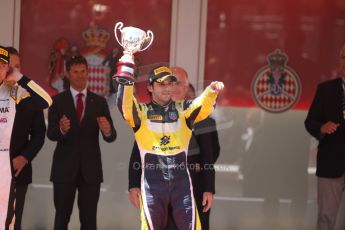 World © Octane Photographic Ltd. Friday 23rd May 2014. GP2 Feature Race – Monaco, Monte Carlo. Felipe Nasr raises hos 3rd place trophy - Carlin. Digital Ref : 0963CB7D3137