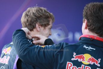 World © Octane Photographic Ltd. 2014 Formula 1 Winter Testing, Circuito de Velocidad, Jerez. Tuesday 27th January 2014. Day 1. Infiniti Red Bull Racing RB10 launch. Sebastian Vettel gets his collar adjusted by Christian Horner. Digital Ref: 0885cb1d9215